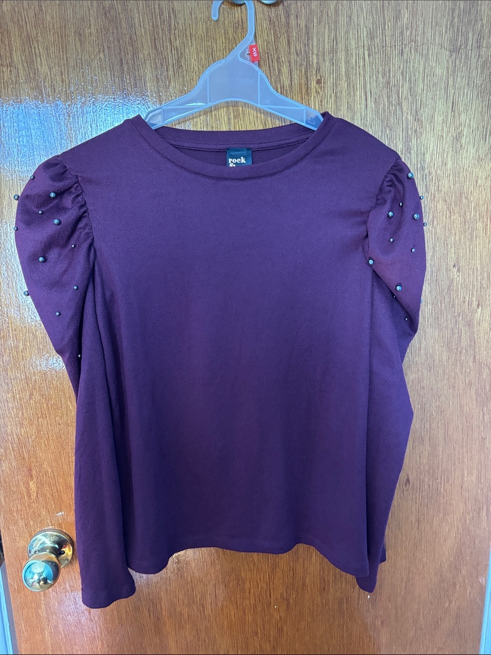 Plum, jeweled top
